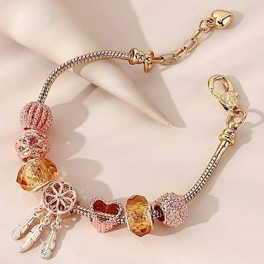 Chic Gold Tone Charm Bracelet Boho Feathers, Sparkle Crystal, and Ornate Beads